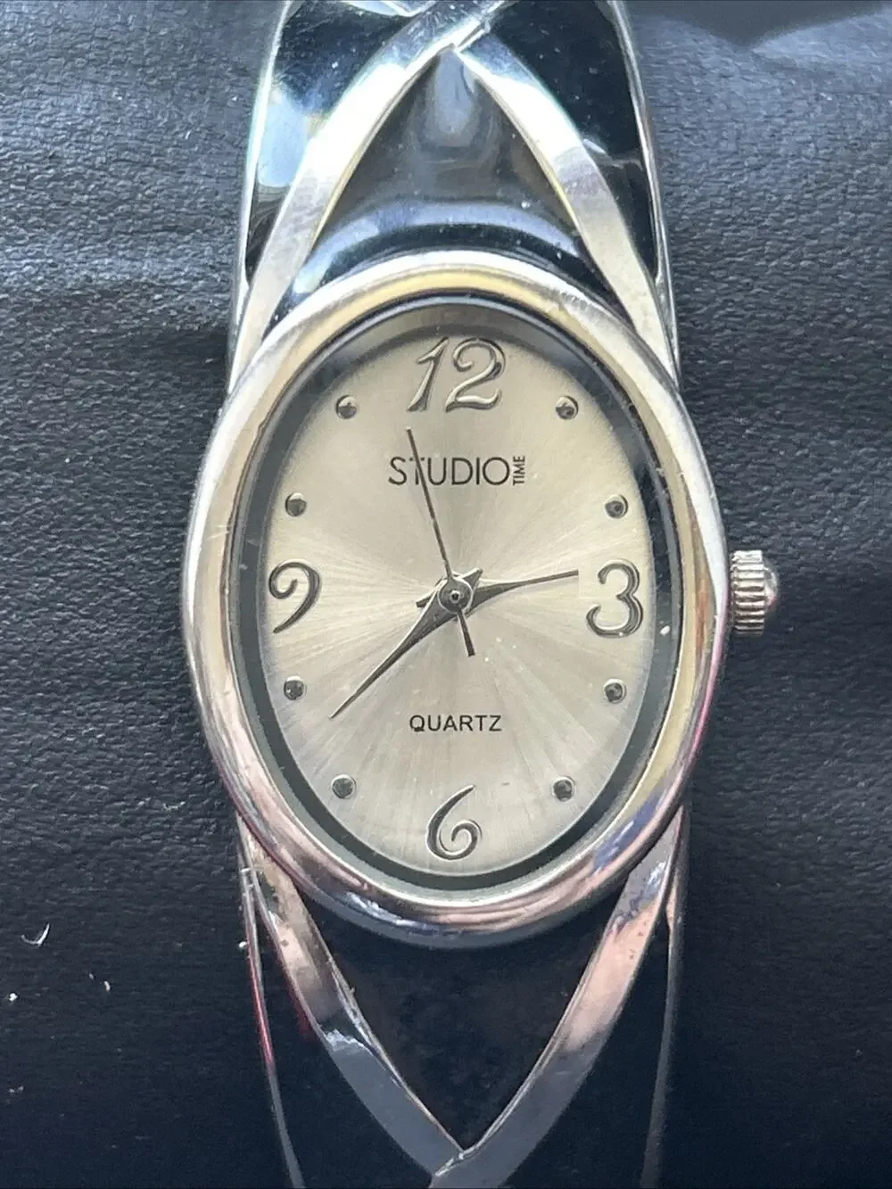 Studio Time Silver Tone And Black Band Women’s Cuff Watch